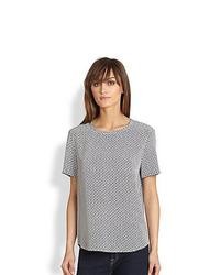 graues T-Shirt mit einem Rundhalsausschnitt mit geometrischen Mustern