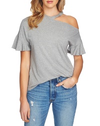graues T-Shirt mit einem Rundhalsausschnitt mit Rüschen