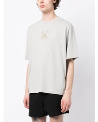 graues T-Shirt mit einem Rundhalsausschnitt von Off-White