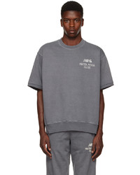 graues T-Shirt mit einem Rundhalsausschnitt von CARHARTT WORK IN PROGRESS