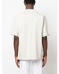 graues T-Shirt mit einem Rundhalsausschnitt von Stone Island