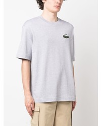 graues T-Shirt mit einem Rundhalsausschnitt von Lacoste