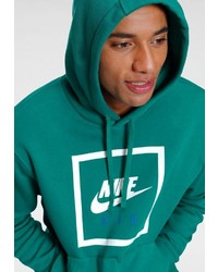 grüner bedruckter Pullover mit einem Kapuze von Nike Sportswear