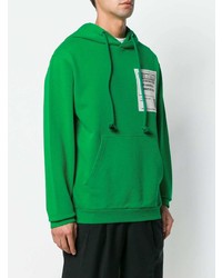 grüner bedruckter Pullover mit einem Kapuze von Maison Margiela