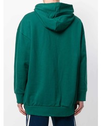 grüner bedruckter Pullover mit einem Kapuze von adidas