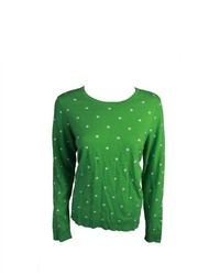 grüner gepunkteter Pullover mit einem Rundhalsausschnitt
