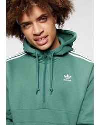 grüner Pullover mit einem Kapuze von adidas Originals