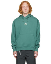 grüner Pullover mit einem Kapuze von Nike