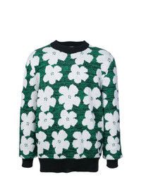 grüner Pullover mit einem Rundhalsausschnitt mit Blumenmuster