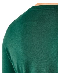grüner Pullover mit einem Rundhalsausschnitt von Falke