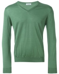 grüner Pullover mit einem V-Ausschnitt