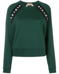 grüner verzierter Pullover