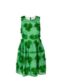 grünes ausgestelltes Kleid mit Blumenmuster