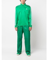 grünes besticktes Polohemd von adidas