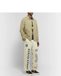 hellbeige bedruckte Chinohose von Human Made