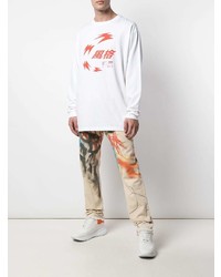 hellbeige bedruckte Jeans von Heron Preston