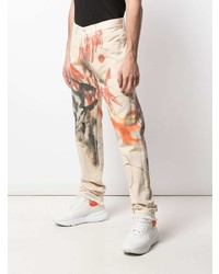 hellbeige bedruckte Jeans von Heron Preston