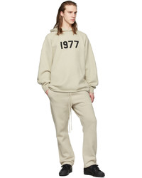 hellbeige bedruckter Pullover mit einem Kapuze von Essentials