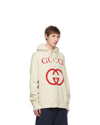 hellbeige bedruckter Pullover mit einem Kapuze von Gucci