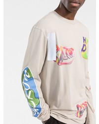 hellbeige bedrucktes Langarmshirt von Heron Preston