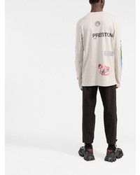 hellbeige bedrucktes Langarmshirt von Heron Preston