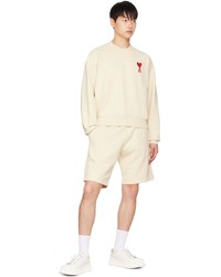 hellbeige bedrucktes Sweatshirt von AMI Alexandre Mattiussi