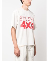 hellbeige bedrucktes T-Shirt mit einem Rundhalsausschnitt aus Netzstoff von Stussy