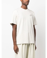 hellbeige bedrucktes T-Shirt mit einem Rundhalsausschnitt von Nike