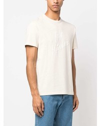 hellbeige bedrucktes T-Shirt mit einem Rundhalsausschnitt von MAISON KITSUNÉ