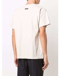 hellbeige bedrucktes T-Shirt mit einem Rundhalsausschnitt von Fear Of God