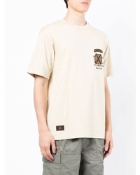 hellbeige bedrucktes T-Shirt mit einem Rundhalsausschnitt von Alpha Industries