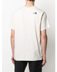 hellbeige bedrucktes T-Shirt mit einem Rundhalsausschnitt von The North Face