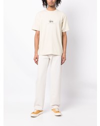 hellbeige bedrucktes T-Shirt mit einem Rundhalsausschnitt von Stussy