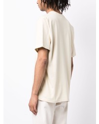 hellbeige bedrucktes T-Shirt mit einem Rundhalsausschnitt von Stussy