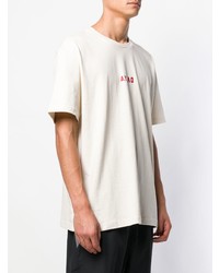 hellbeige bedrucktes T-Shirt mit einem Rundhalsausschnitt von Puma