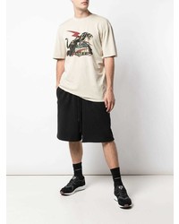 hellbeige bedrucktes T-Shirt mit einem Rundhalsausschnitt von Puma