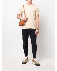 hellbeige bedrucktes T-shirt mit einer Knopfleiste von DSQUARED2