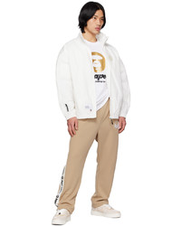 hellbeige bestickte Daunenjacke von AAPE BY A BATHING APE