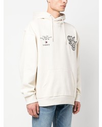 hellbeige bestickter Pullover mit einem Kapuze von Tommy Jeans