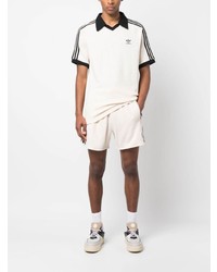 hellbeige besticktes Polohemd von adidas