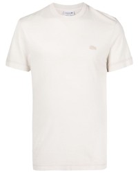 hellbeige besticktes T-Shirt mit einem Rundhalsausschnitt von Lacoste