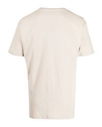 hellbeige besticktes T-Shirt mit einem Rundhalsausschnitt von Tommy Jeans