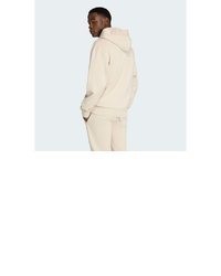 hellbeige Fleece-Pullover mit einem Kapuze von adidas Sportswear