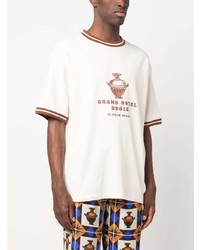 hellbeige horizontal gestreiftes T-Shirt mit einem Rundhalsausschnitt von Drôle De Monsieur