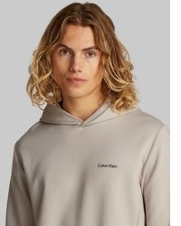 hellbeige Pullover mit einem Kapuze von Calvin Klein
