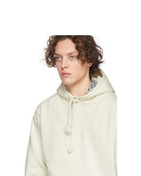 hellbeige Pullover mit einem Kapuze von JW Anderson