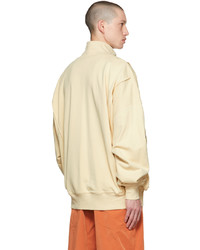 hellbeige Pullover mit einem Reißverschluss am Kragen von A. A. Spectrum