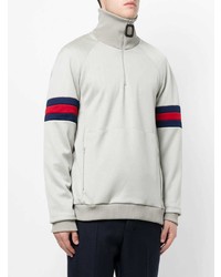 hellbeige Pullover mit einem Reißverschluss am Kragen von JW Anderson