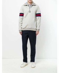 hellbeige Pullover mit einem Reißverschluss am Kragen von JW Anderson