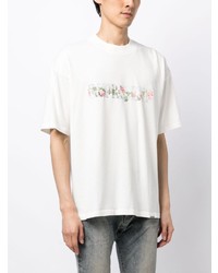 hellbeige T-Shirt mit einem Rundhalsausschnitt mit Blumenmuster von Represent